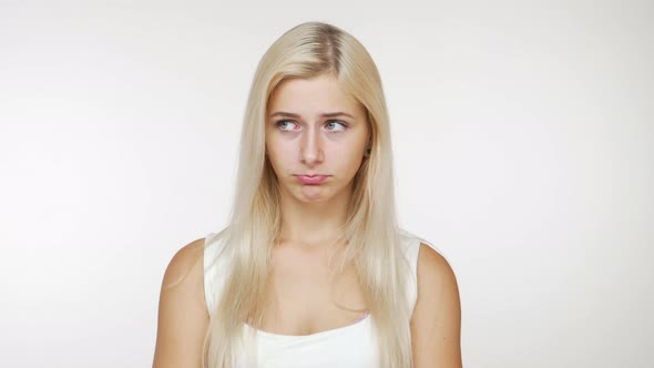 Caucasian Attractive Blondie Girl Looking at Camera Pretending to Be Hurt Pouting Nodding Positively alt