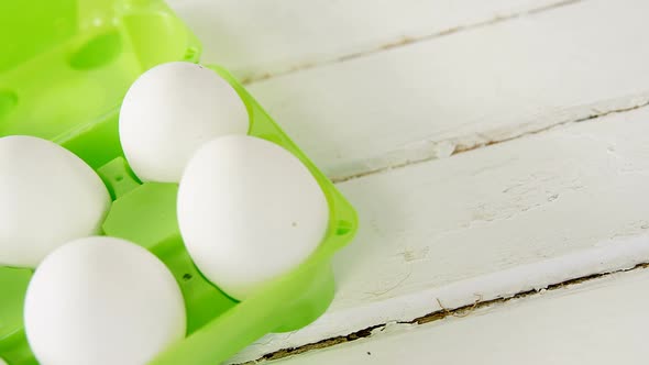 Close-up of Easter white eggs in egg carton alt
