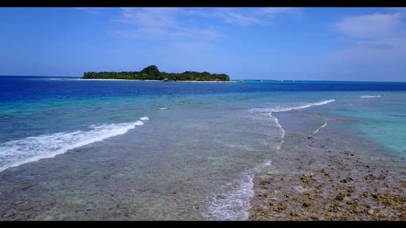 Aerial drone view landscape of beautiful sea view beach holiday by aqua blue sea with white sandy ba alt