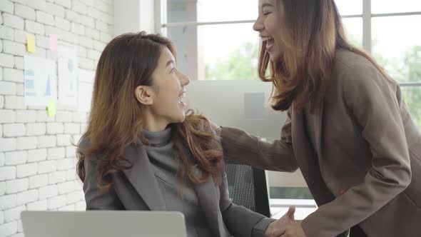 Professional business women working at her office. alt