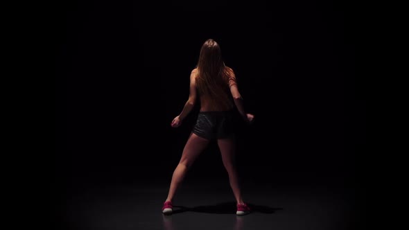 Model with Slender Body Dancing Twerk Her Buttocks. Slow Motion alt