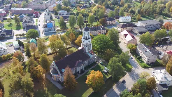 Latvia, Aluksne Old Lutheran Church With Golden Cock Statue on the Top of Tower, Aerial Dron 4K Shot alt