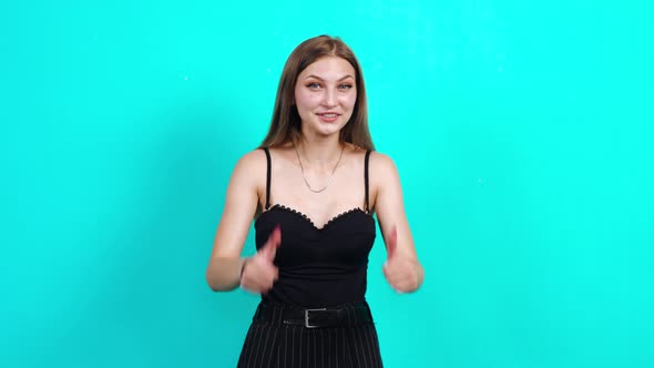 Woman Showing Ok Sign and Smiling Fulfilled at the Camera. Charming Girl alt