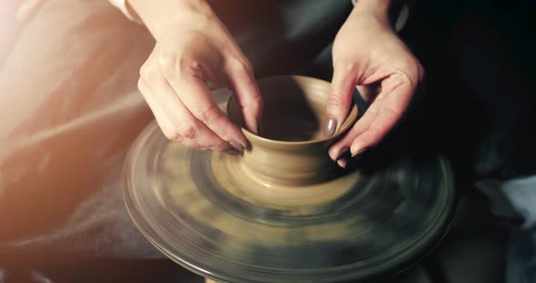 Woman Makes Clay Jug