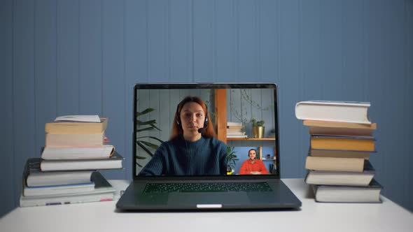 Video Communication Online Via a Laptop alt