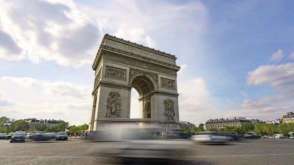 Paris, France, Timelapse - The Arc de Triomphe and the city traffic on the Champs-Elysees
