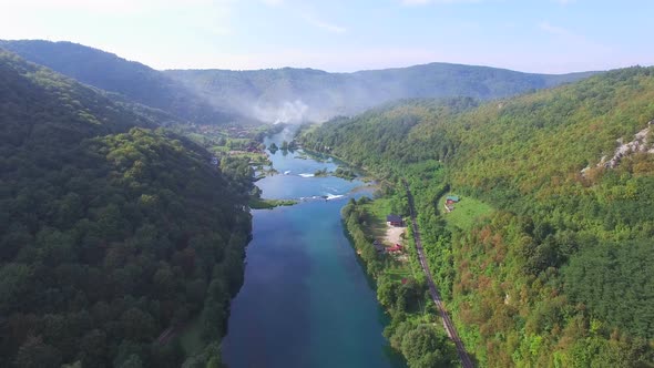 Aerial view of beautiful green canyon and waterfalls of Una river, Bosnia alt
