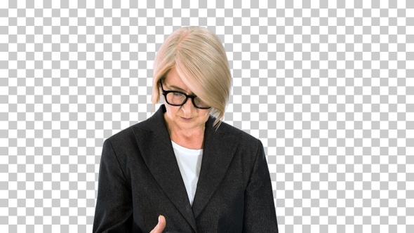 Senior businesswoman texting on a smartphone, Alpha Channel alt