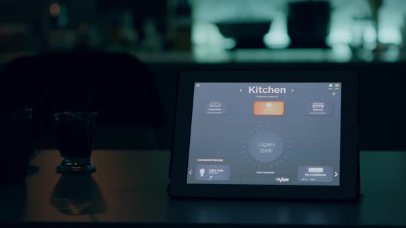 Close Up of Tablet with Wireless Lighting Automation Software Placed on Table alt