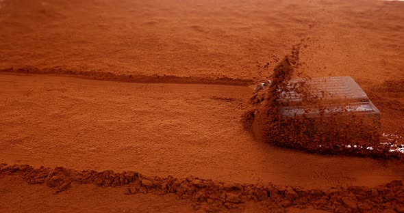 Chocolats Sliping on Black Chocolate Powder, Slow Motion 4K alt