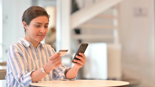 Casual Young Man with Back Pain Using Laptop at Home alt