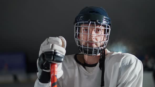 Portrait of a Forward Hockey Player Seriously Looking at the Camera Steam Coming From the Athlete's alt