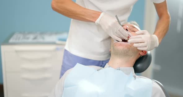 Patient with Dental Braces During a Regular Orthodontic Visit alt
