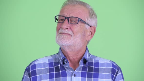 Face of Stressed Senior Bearded Hipster Man Having Neck Pain alt