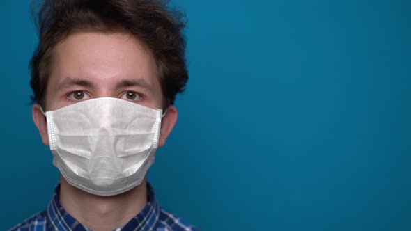 Boy Feeling Sick and Wearing Mask alt