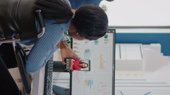 Video Vertical African Employee with Disabilities Paralyzed Invalid Explaining Financial Reports alt