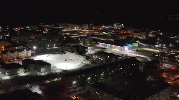 Night Landscape on a Winter City in the Arctic