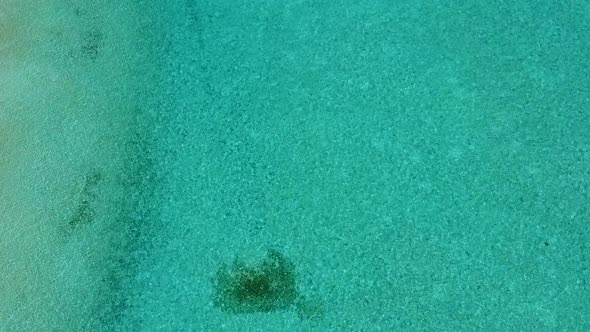 Aerial drone scenery of sea view beach by sea with sand background alt