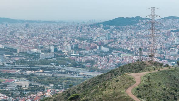Barcelona and Badalona Skyline with Roofs of Houses and Sea on the Horizon at Evening Timelapse alt