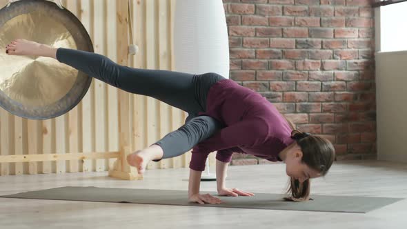 Beautiful Athletic Sporty Woman Doing Yoga Exercises Indoors alt