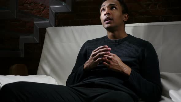 Thinking Pensive African Man Brainstorming for New Idea at Night alt