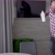 A Bearded Man in Wireless Headphones Walks Through the Kitchen with a Bottle of Milk and Dances - VideoHive Item for Sale