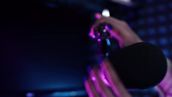 Lovely Young Girl Dj Speaks Into the Microphone