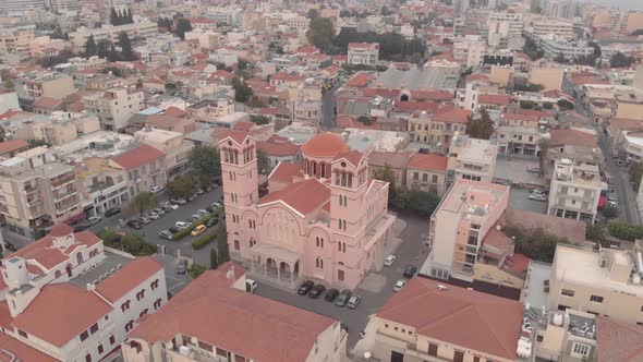 4K drone views of a beautiful Pink Cathedral of Virgin Mary Pantanassis in Limassol, Cyprus alt