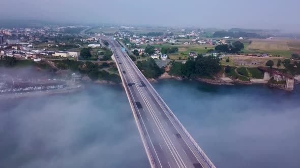 Aerial View on Dos Santos Bridge During Fog and Bay. Near Ribadeo in Northern Spain