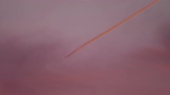 Airplane in the Sky, Sunset Sun Reflection alt