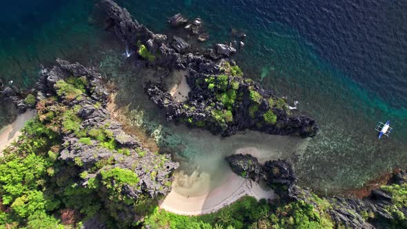 Drone Of Trees Cliffs And Coastline On Island alt