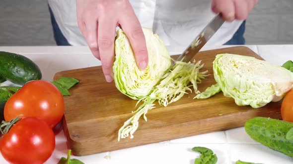 Close-up video of cutting cabbage