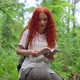 Reading a Book in The Forest - VideoHive Item for Sale