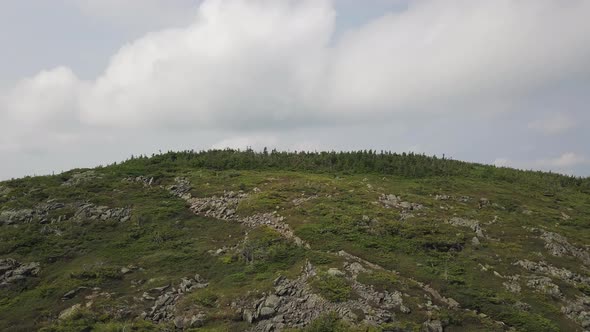 Aerial footage of White Cap Mountain situated within the watershed of the Pleasant River located in alt