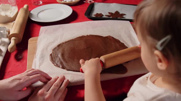 Mother and Daughter Making Gingerbread at Home