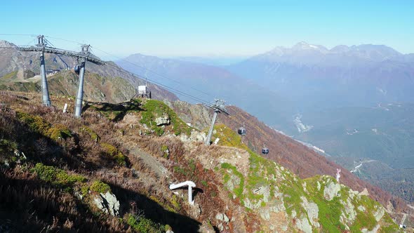 Moving Cabins of the Cable Road. Funicular with Words Rosa Khutor on Cabins. Russia. alt