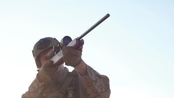 Military Sniper Takes Aim at the Optical Sight. Airsoft