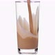 Pouring Chocolate Milk into a Glass - VideoHive Item for Sale