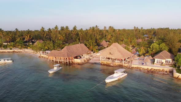 Paradise Beach Resort with Palm Trees and Hotels By Ocean Zanzibar Aerial View alt