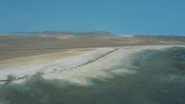 Reveal shot coastline and desert in Paracas National Reserve in Peru 4K