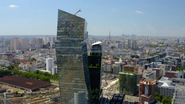 Panoramic aerial view, the Eiffel Tower & buildings & skyscrapers in Paris.  alt