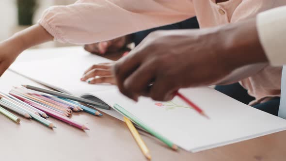 Cropped Shot Closeup Three Pairs of Hands with Dark Skin Afro American Unrecognizable Family Draw alt