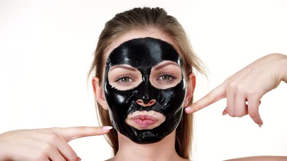 Girl Dried Peel Off Black Mask on Face