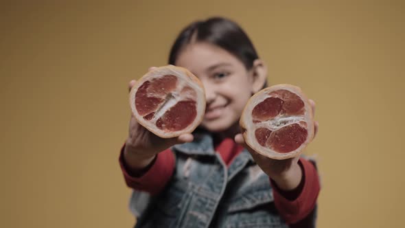 Little Blonde Boy Wearing Big Headphones and Nodding His Head alt