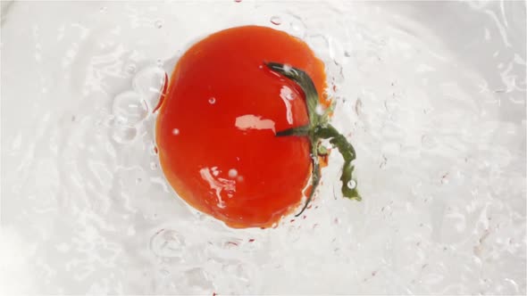 Red Tomato Falling and Plunging in Water alt