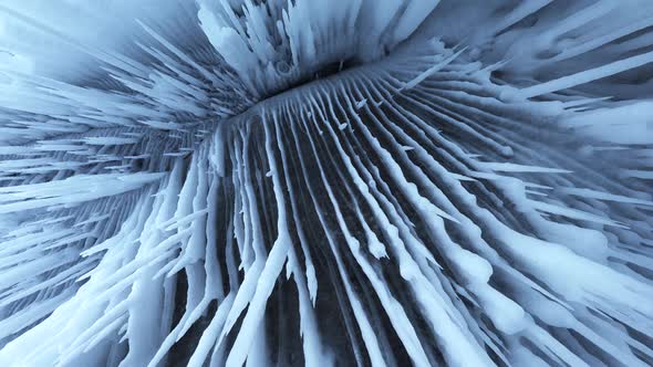 Crystal Blue Icicles Sharp Stalactites in Frozen Grotto of Baikal