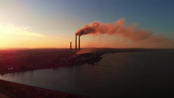 Aerial Drone View: High Chimney Pipes with dirt smoke from Coal Power Plant