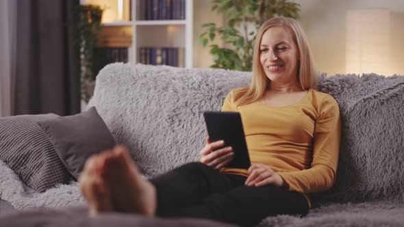 Woman Having Video Chat on Tablet