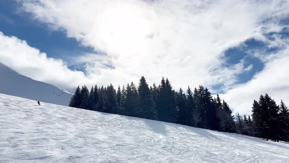 View of the Ski Tracks on Alpine Resort From Skiing Lift alt