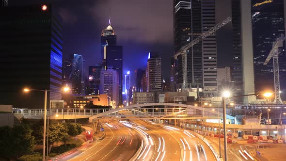 Time-lapse of Hong Kong city and traffic at night alt